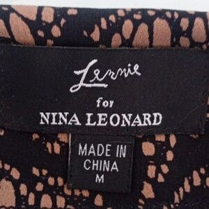 Lace Look  and Black NINA LEONARD dress. This Dress has never been worn.